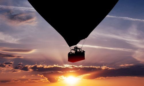 Hot air balloon silhouette in the sunset